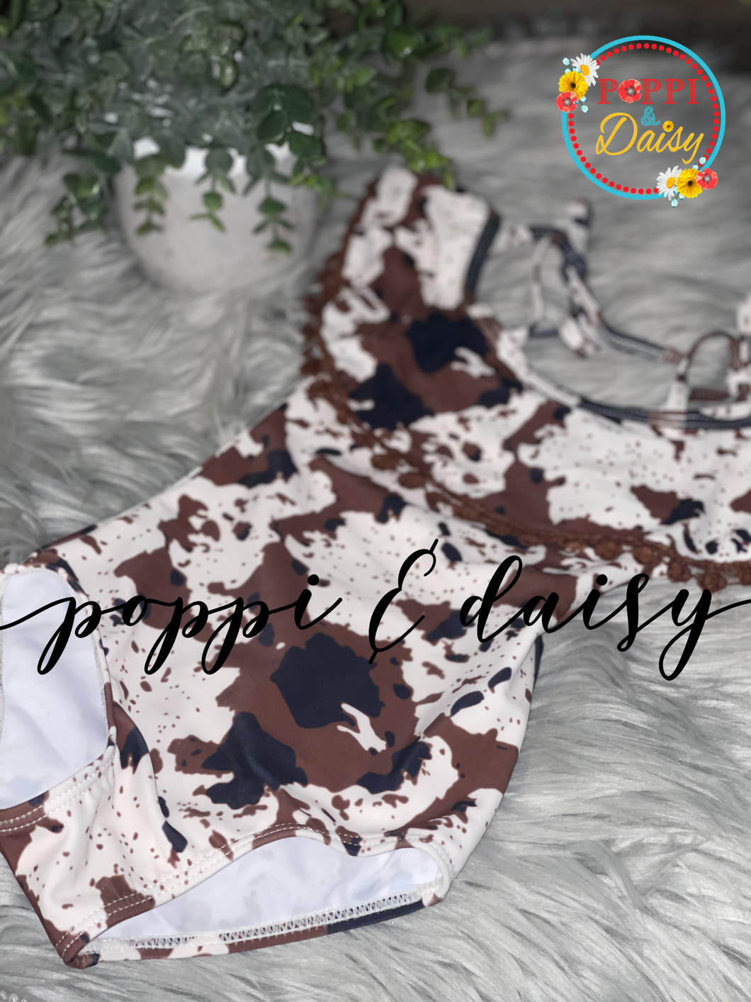 Cow print one-piece bathing suit